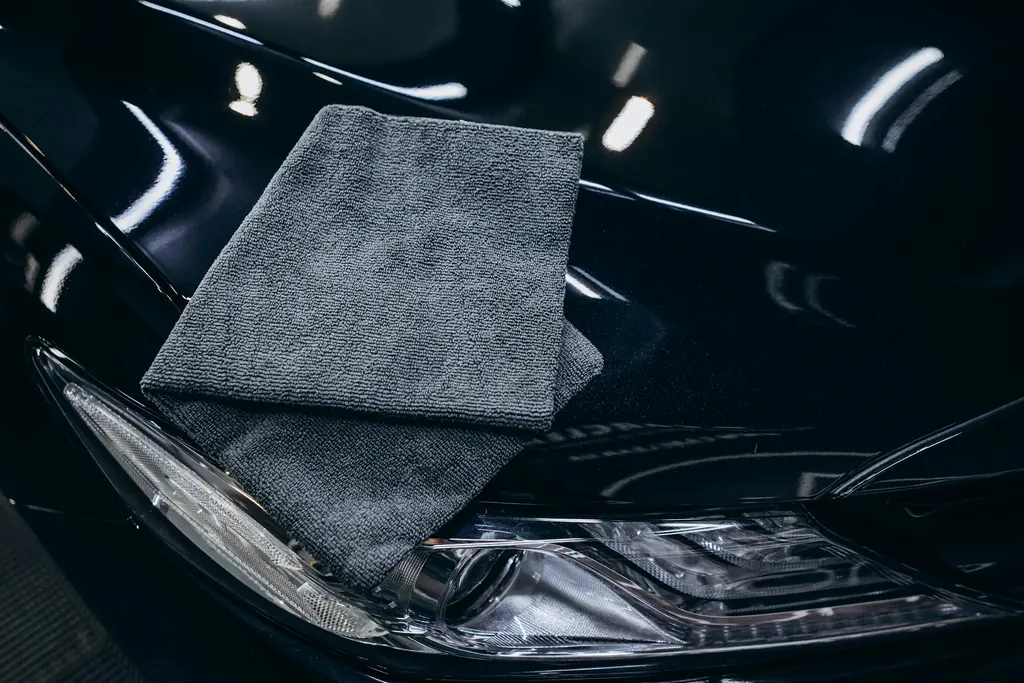 Generic detailing tools and microfibre materials as process context, not a Joker Auto Detailing studio inventory claim.